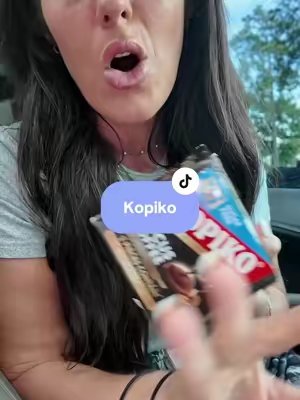 TikTok post by @kayetheldickerson for Kopiko USA. Caption reads: •natural• caffeine COFFEE [candies] @Kopiko US....