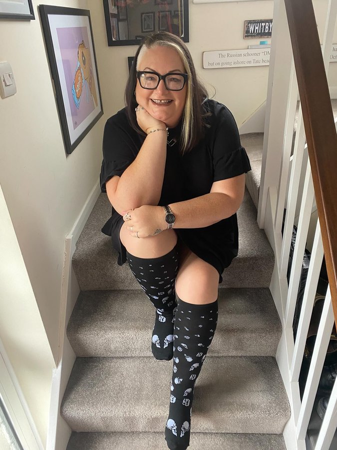 Instagram post by @kat_ie_wears for Plusock. Caption reads: [...] these spooky-cute Halloween socks from....