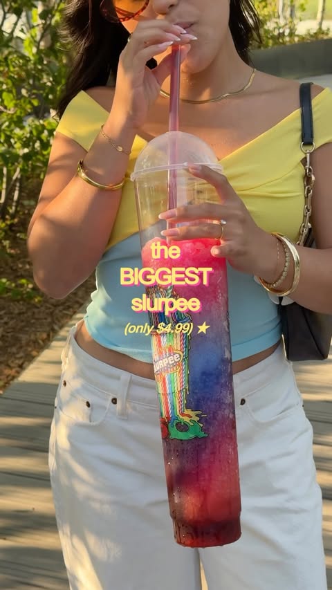 Instagram post by @slurpeecanada for 7-ELEVEN. Caption reads: 93 oz of Slurpee?! 🥤🌈⭐️ @7elevencanada is....
