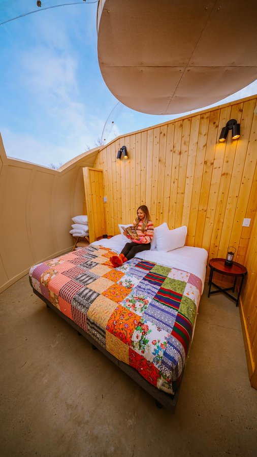 Instagram post by @wellnesstravelled for Travel Alberta. Caption reads: It’s called @metiscrossing and it needs to be on....