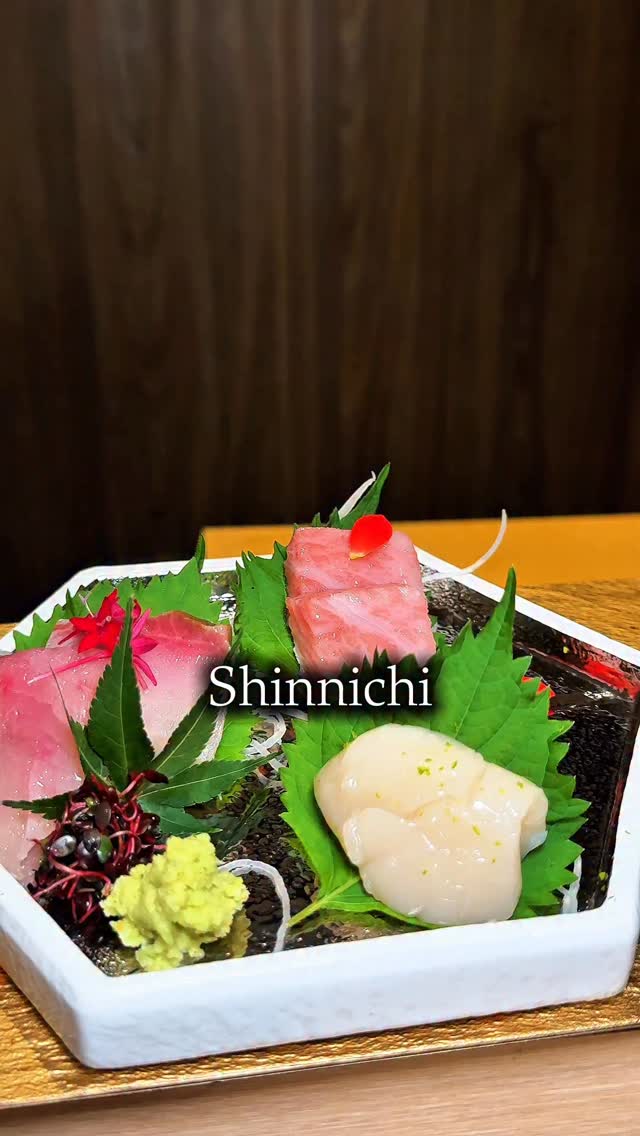 Instagram post by @munchingmomentswithm for Singapore Travel Specialist by Dirgantara Fasa. Caption reads: Newly opened Shinnichi serves a focused omakase....