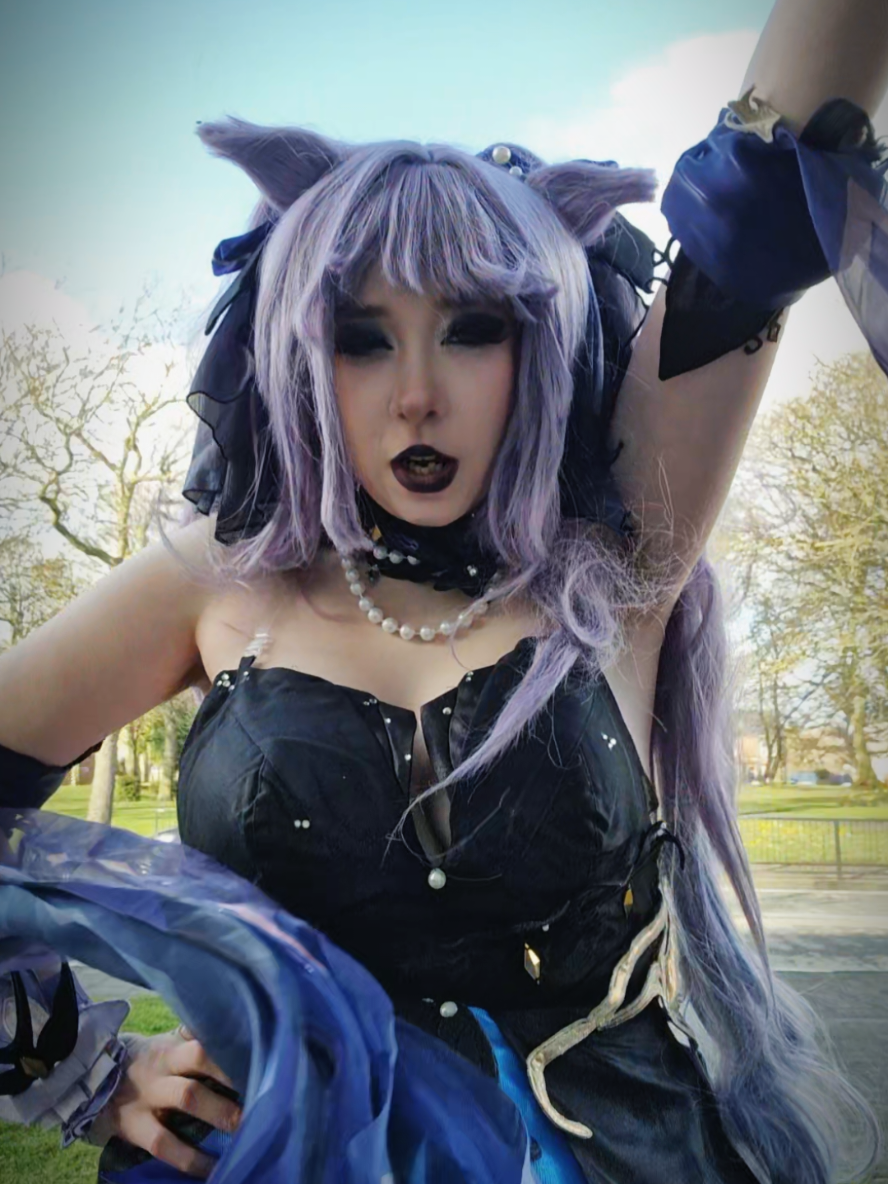 TikTok post by @violet..requiem for dokidokicosplay. Caption reads: Ignore the fact that the sleeve hits me in the....