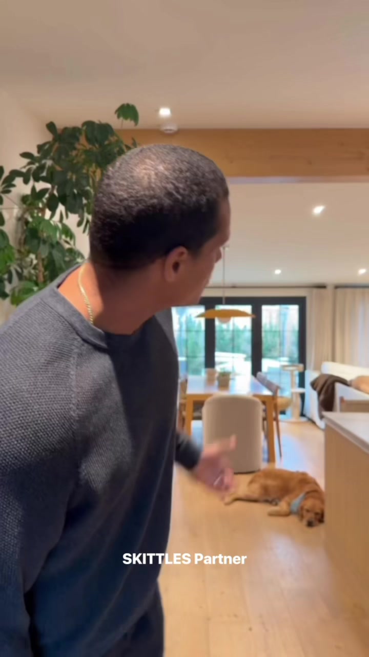 TikTok post by @isaacrochell for SKITTLES. Caption reads: #SKITTLESPartner What in the Elijah Wood is [...].