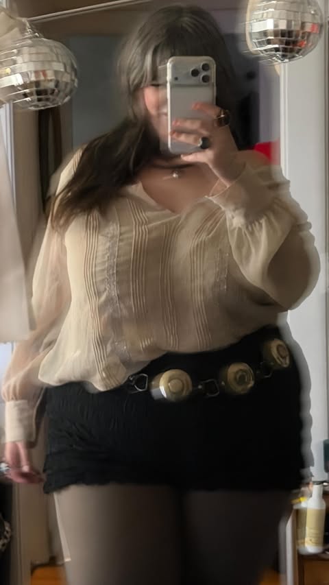 Instagram post by @courtneycoppa_ for Lane Bryant. Caption reads: Let’s style some vintage @lanebryant 🤩....