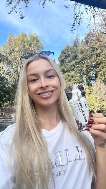 Instagram post by @volha_creative for Simply Gum. Caption reads: I tried the new Fudge Brownie @simplygum Chocolate....