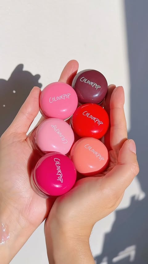 Instagram post by @treasuredbeautyfinds for ColourPop Cosmetics. Caption reads: [...] a pretty blackberry style color!....