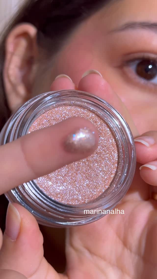 Instagram post by @marinanalha for Half Magic Beauty. Caption reads: You might blind someone with this level of sparkle....