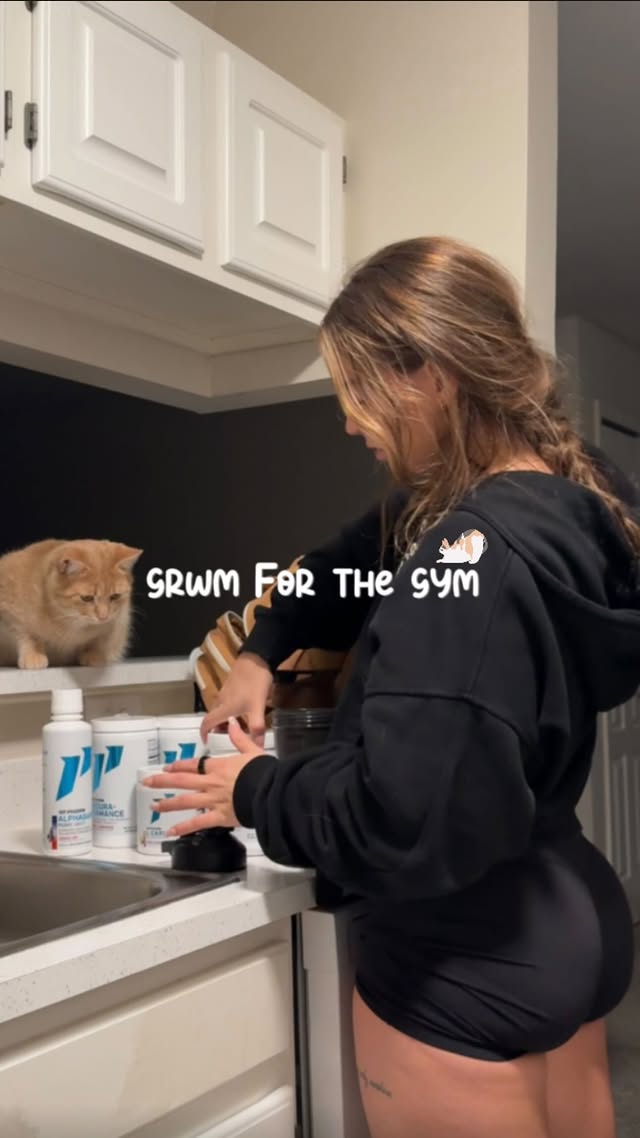 Instagram post by @abbieweiss_.fitness for 1st Phorm. Caption reads: [...] 🐈 grwm + my bby for the gymm thx you....