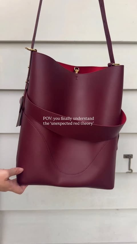 Instagram post by @molly.marsland for OLEADA. Caption reads: [...] red Marina Soft Bucket leather bag from....