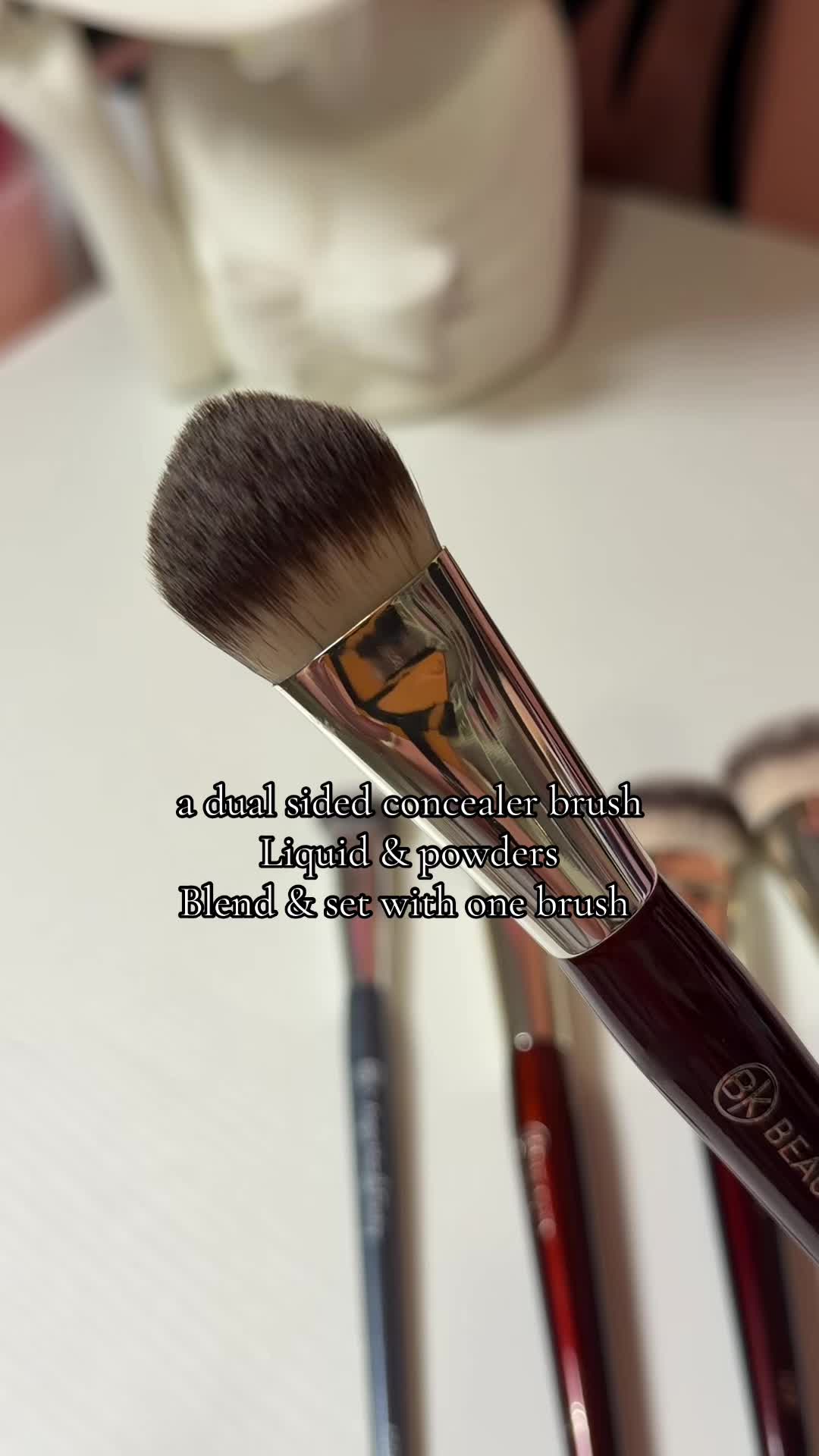 TikTok post by @amandawifey for BK Beauty. Caption reads: @BK Beauty Brushes made a dual sided concealer....