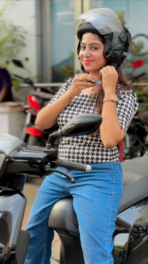 Instagram post by @_dhanaaaa for Hero MotoCorp. Caption reads: Elegance in every ride, Comfort in every mile!....