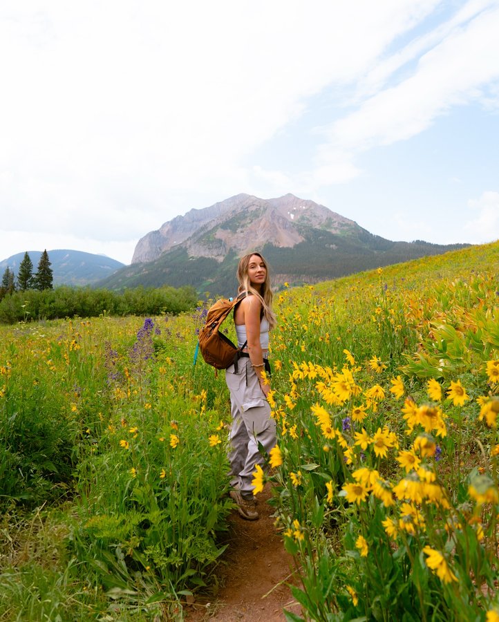 Instagram post by @dashaslens for Merrell. Caption reads: Summer 2025 hiking gear favs 🌼

“It looked like....