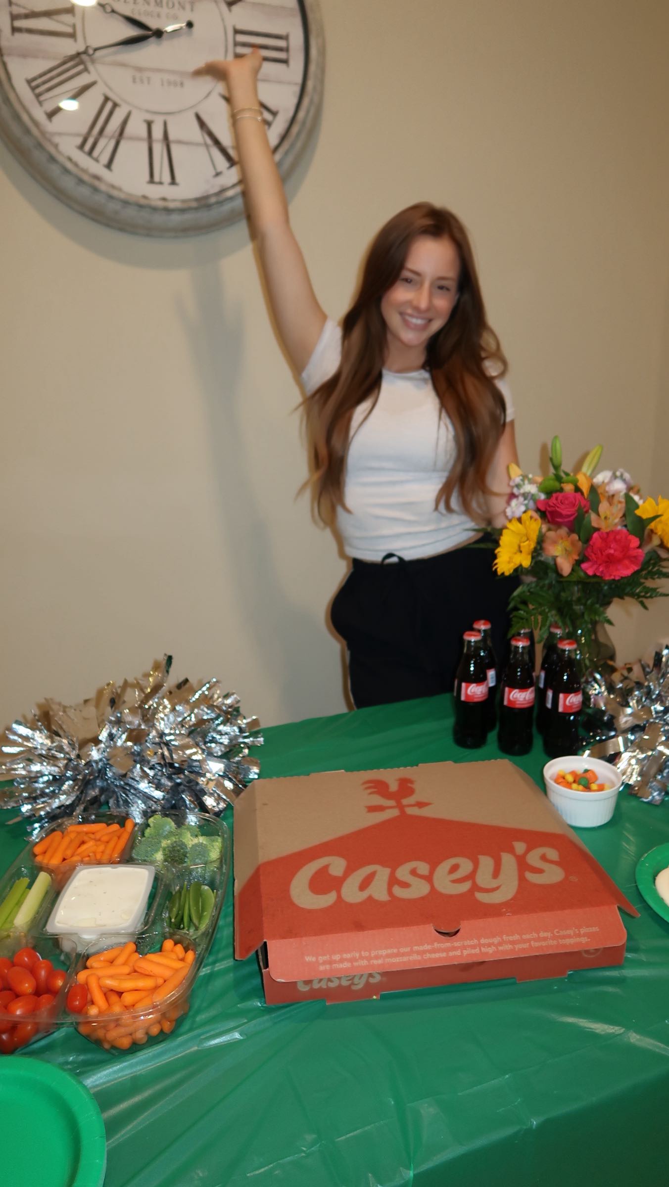 Instagram post by @clairewolford for Casey’s. Caption reads: 40% off whole pizzas every Saturday? That’s how....