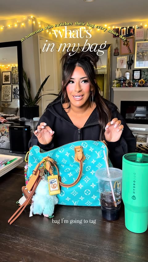 Instagram post by @mariiahjasmiine for Touchland. Caption reads: ⚡️what’s in my bag as someone who switches her bag....