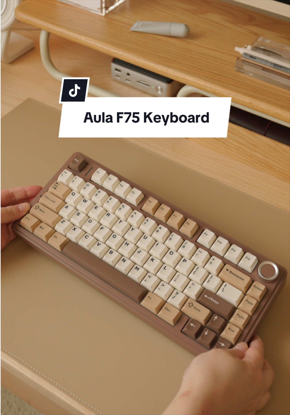 TikTok post by @lifewithhollylifestyle for Aula. Caption reads: A pretty brown keyboard from @Aula 🤎 Please....