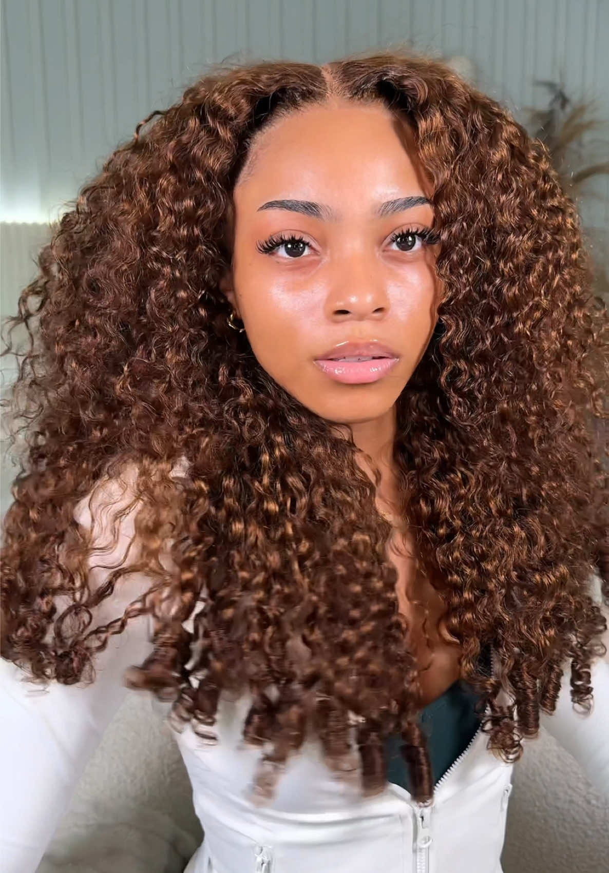 TikTok post by @niyahmariiie for OQHAIR. Caption reads: [...] about this hair 🫶🏽 @OQHAIR @oqhairshop i’m....