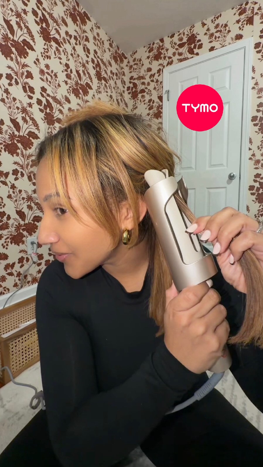 Instagram post by @iambrandyalexis for TYMO Beauty. Caption reads: The most relaxing curling session ever, no wrists....