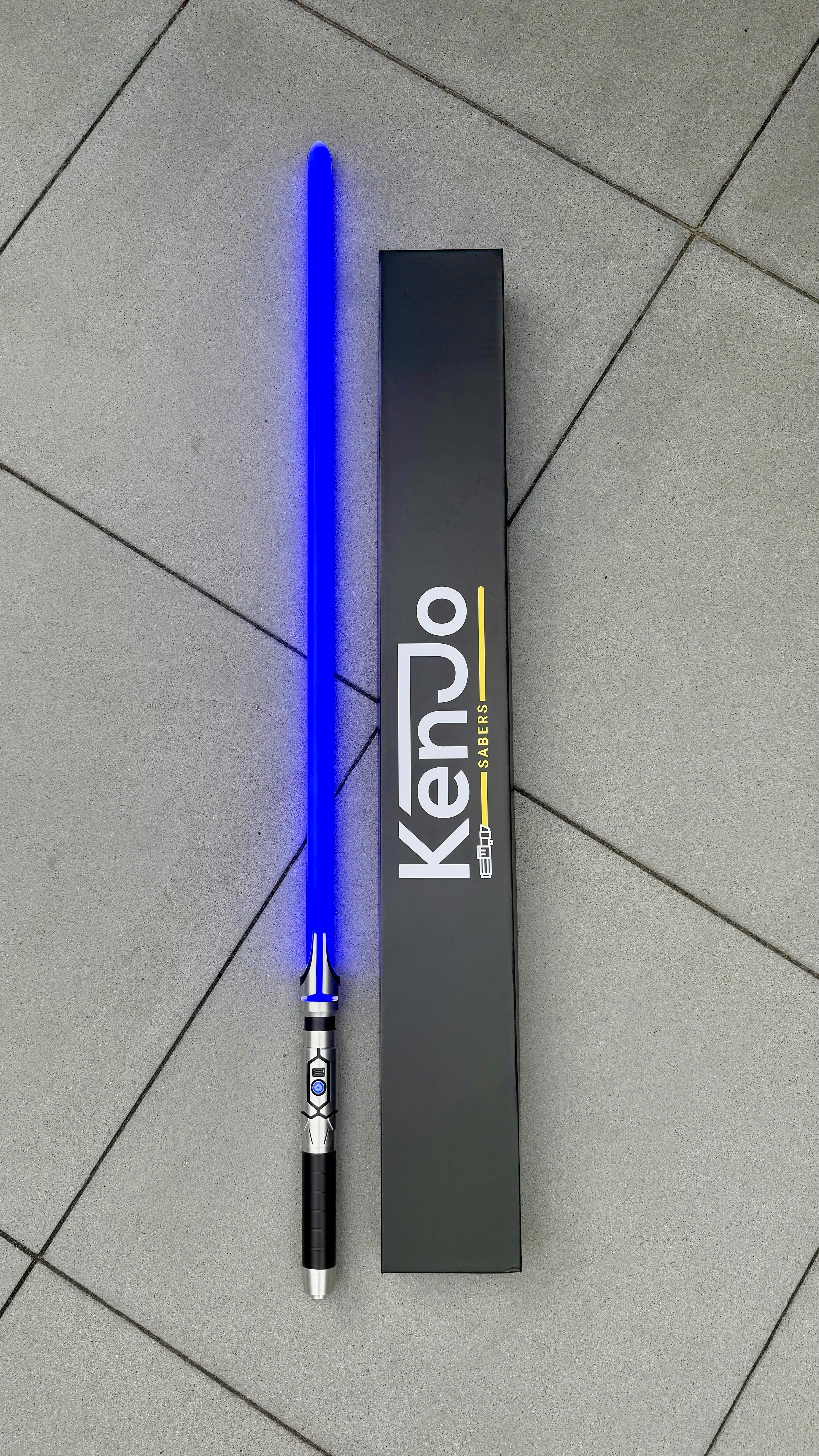 Instagram post by @mariicosplays for KenJo Sabers. Caption reads: [...] you ⚔️✨ *ad #starwars #lightsaber....