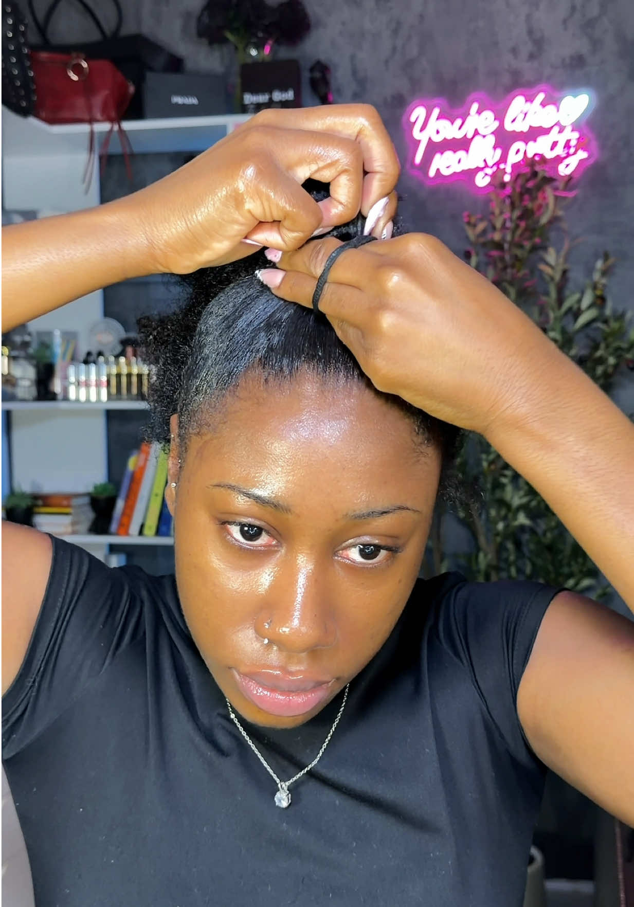 TikTok post by @arriisbad for OQHAIR. Caption reads: Style my short natural hair with me using @OQHAIR....