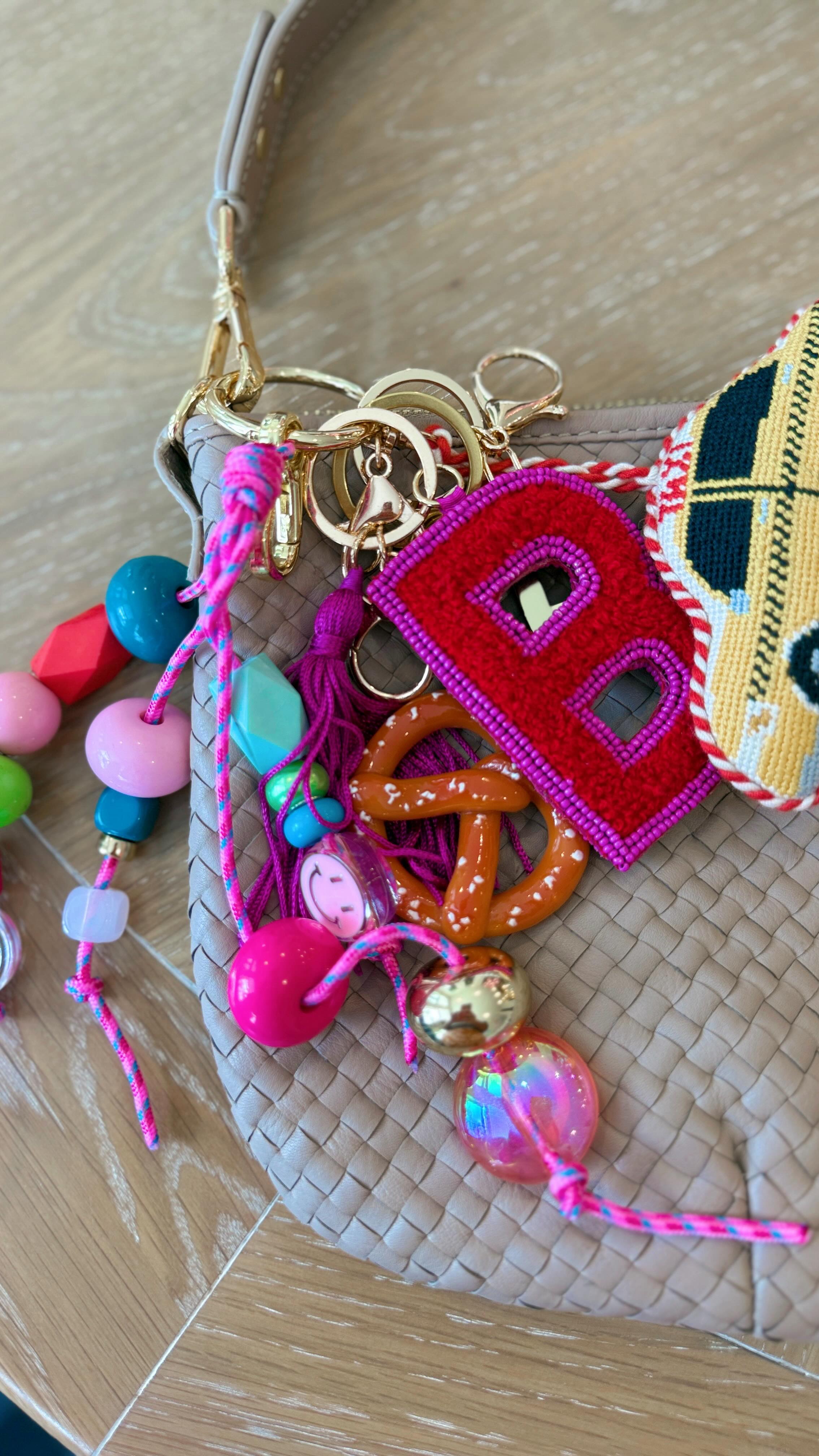 Instagram post by @brittanyyoungofficial for BaubleBar. Caption reads: On a crafting kick! Comment CHARM to shop the....