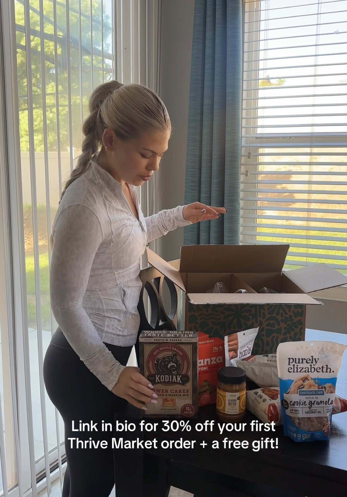 TikTok post by @miahowerton for Thrive Market. Caption reads: what i eat in a day ft. @Thrive Market 🥞🥣🍫🍝....