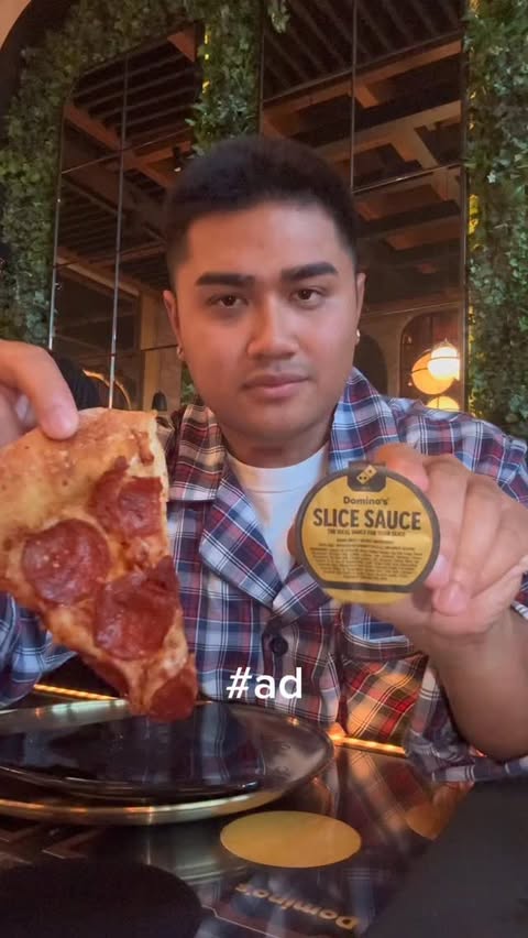 Instagram post by @natelo98 for Domino's Pizza. Caption reads: #ad @dominos new Slice Slice is here and it’s a....