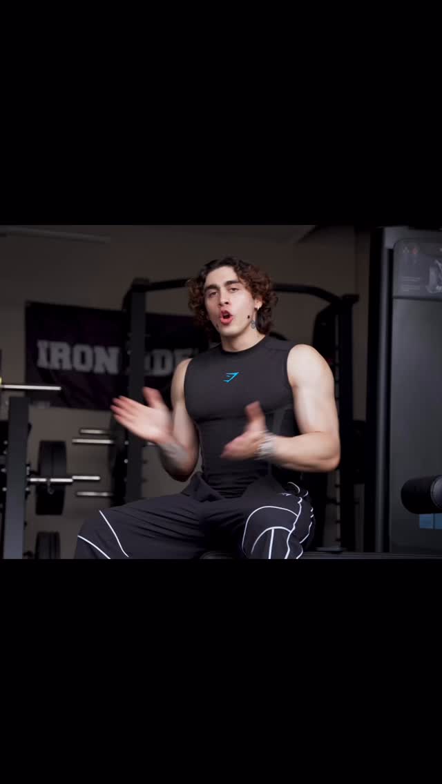 Instagram post by @carlosbelcast for Gymshark. Caption reads: Video completo en mi canal de YouTube!!

🦈....
