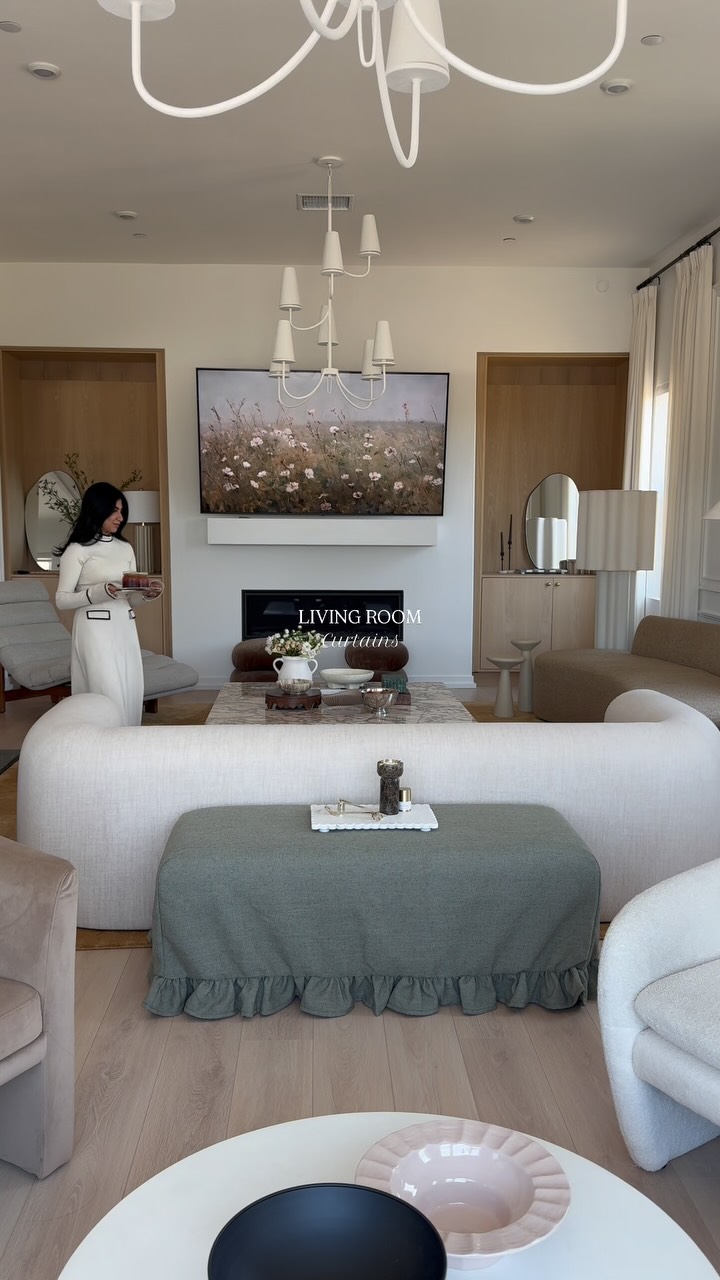 Instagram post by @twopagescurtains for RugsUSA. Caption reads: LIVING ROOM CURTAINS• hosting has officially moved....