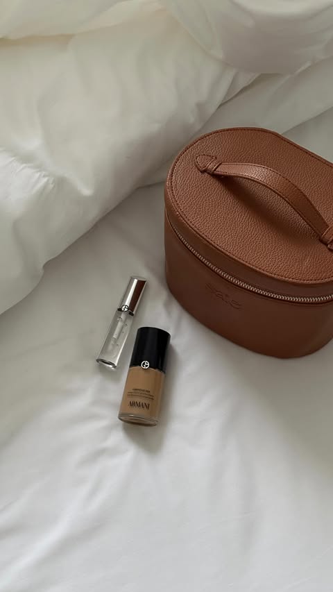 Instagram post by an influencer for Armani beauty. Caption reads: [...] make it effortless ✨ using @armanibeauty....