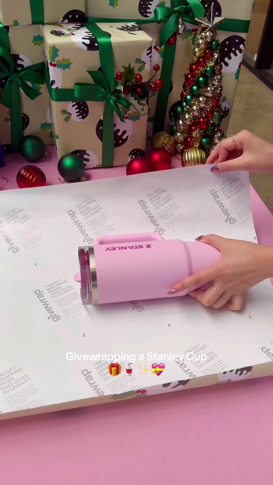 TikTok post by @givewrap for Stanley 1913. Caption reads: Thirsty for more givewrapping tips and bad puns?....