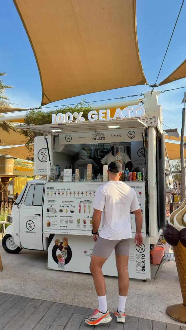 Instagram post by @_elodypetit for Visit Abudhabi. Caption reads: [...] 🌞🌊🍧🍦 (best way!!!) #InAbuDhabi....