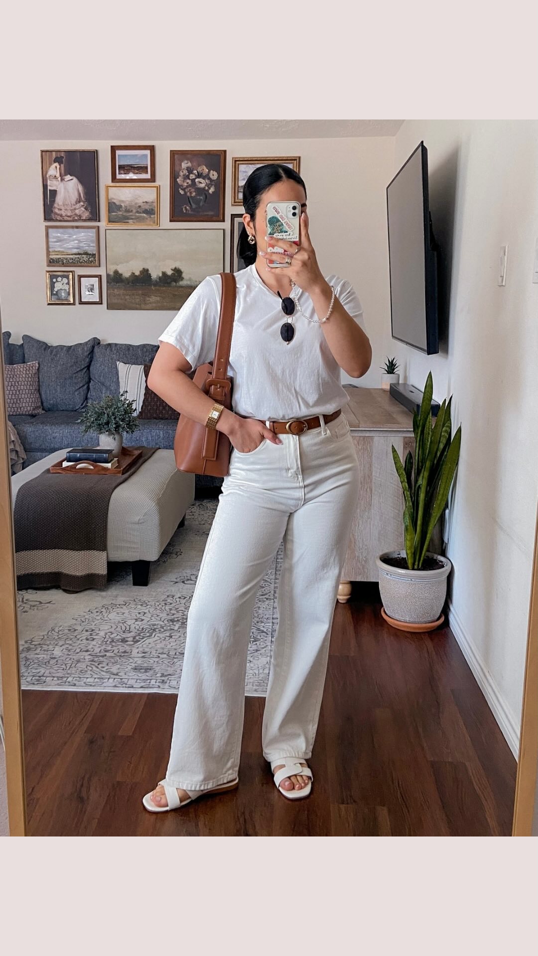 Instagram post by @jessicamelgoza_ for Larsson & Jennings. Caption reads: [...] ft. my timeless accessory from....