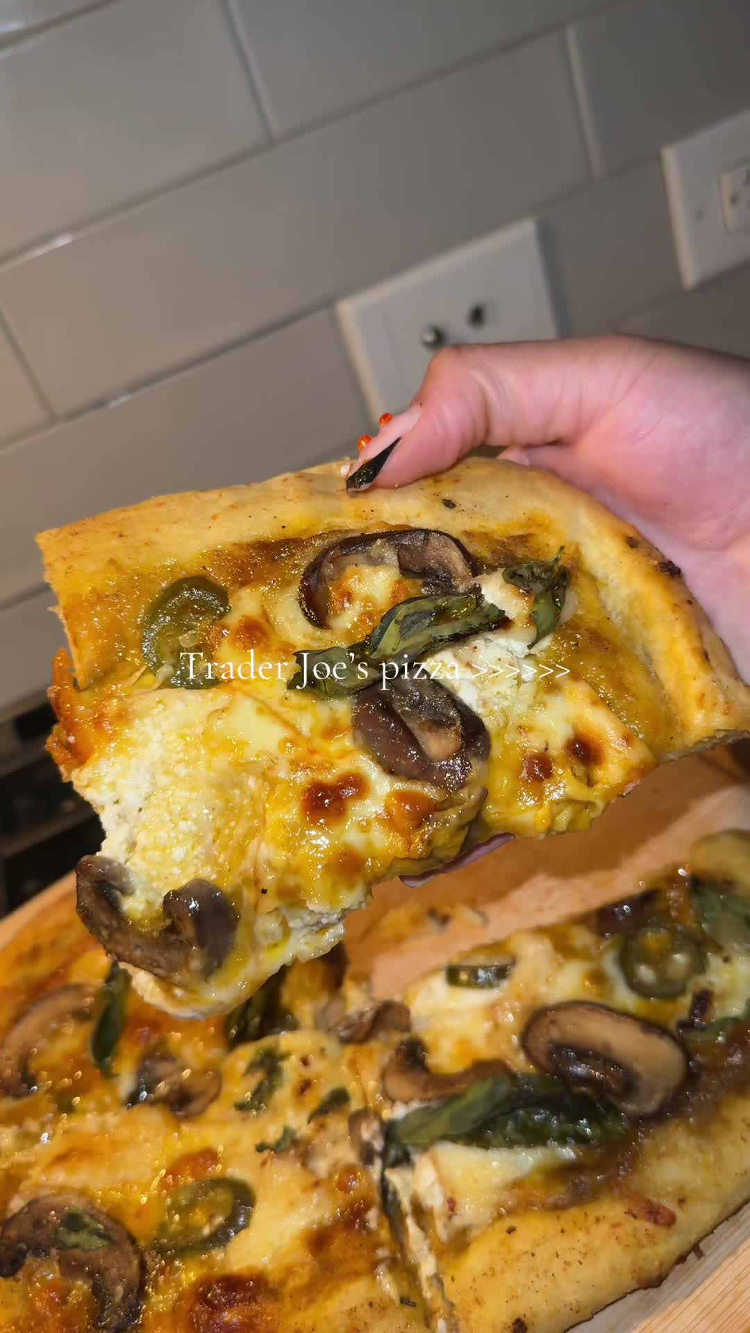 TikTok post by @wherewebouttaeatatt for Mike's Hot Honey. Caption reads: [...] every pizza I’m eating 🔥 #mikeshothoney....