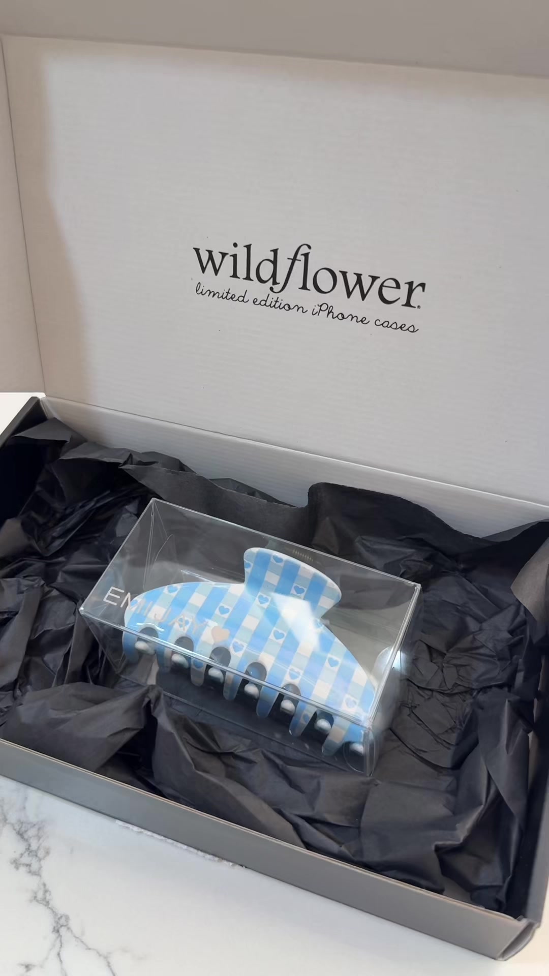 TikTok post by @valerie.montoya for Wildflower Cases. Caption reads: so effing obsessed 💘 @Wildflower Cases @Emi Jay....