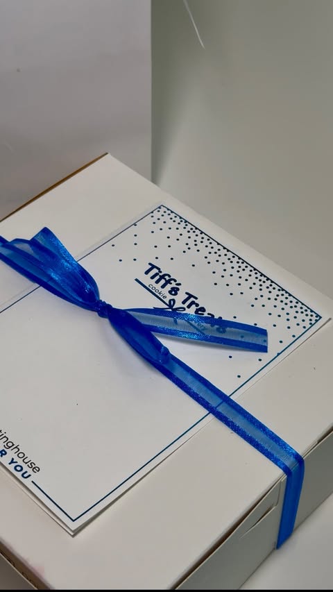 Instagram post by @eatswjoy for Tiff's Treats. Caption reads: I don’t play about my Tiff’s @tiffstreats . 🍪🤎....