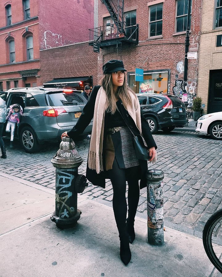 Instagram post by @kristinmtran for Few Moda. Caption reads: Just got my hands on the Caara Tortine Skirt from....