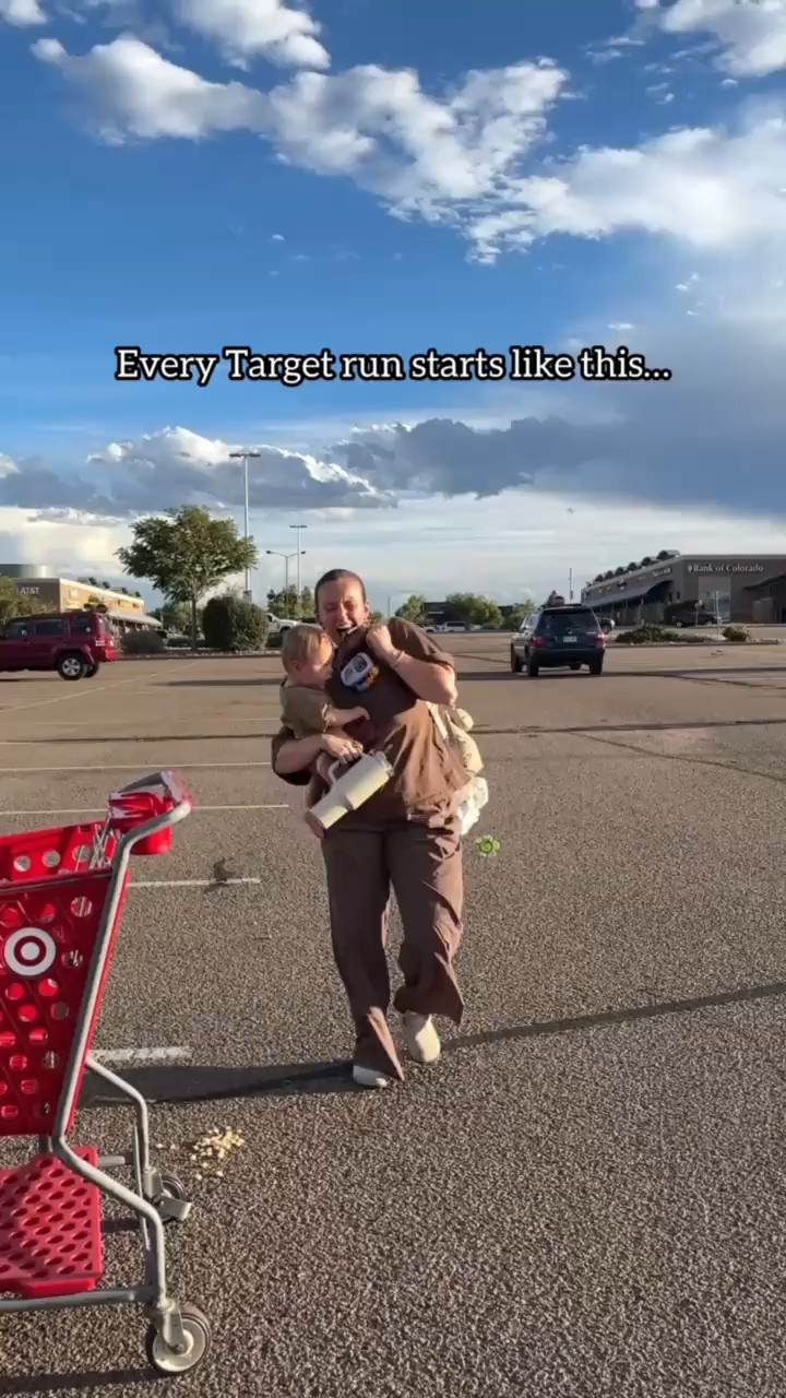 Instagram post by @rachel.lampton for Ergobaby. Caption reads: Target run without the Upsie = chaos.
Target run....