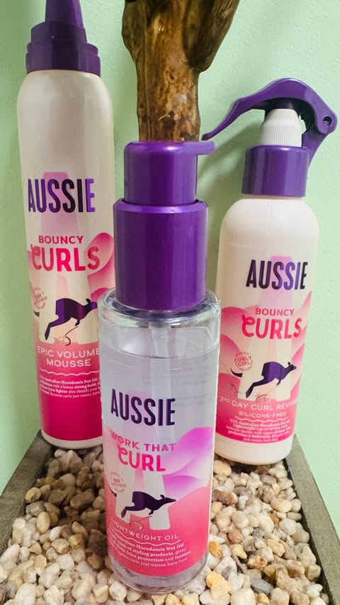 Instagram post by @motherhoodwithbeth for Aussie Hair. Caption reads: [...] with my three best hair friends from....