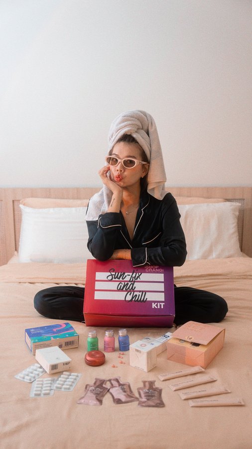 Instagram post by @amebeverly for iShopChangi. Caption reads: Singapore’s weather’s wild, but this Sun Fix and....