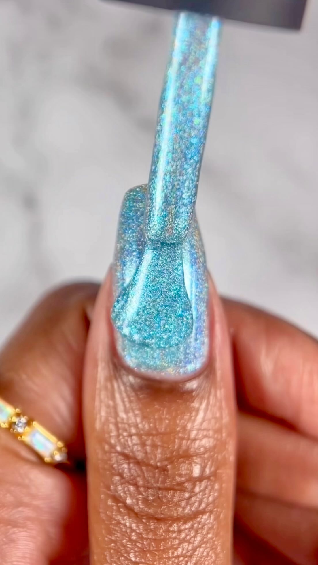 Instagram post by @suziemoon626 for Holo Taco. Caption reads: ✨ Birthstone - Returning Polishes✨

They’re back....