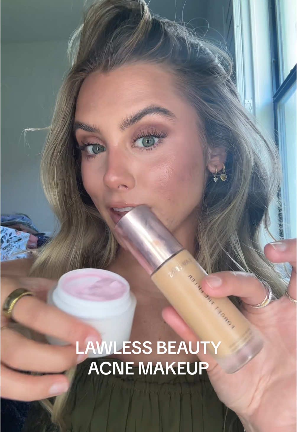 TikTok post by @sloanevosen for LAWLESS Beauty. Caption reads: [...] best part ACNE SAFE 👏 @LAWLESS Beauty....