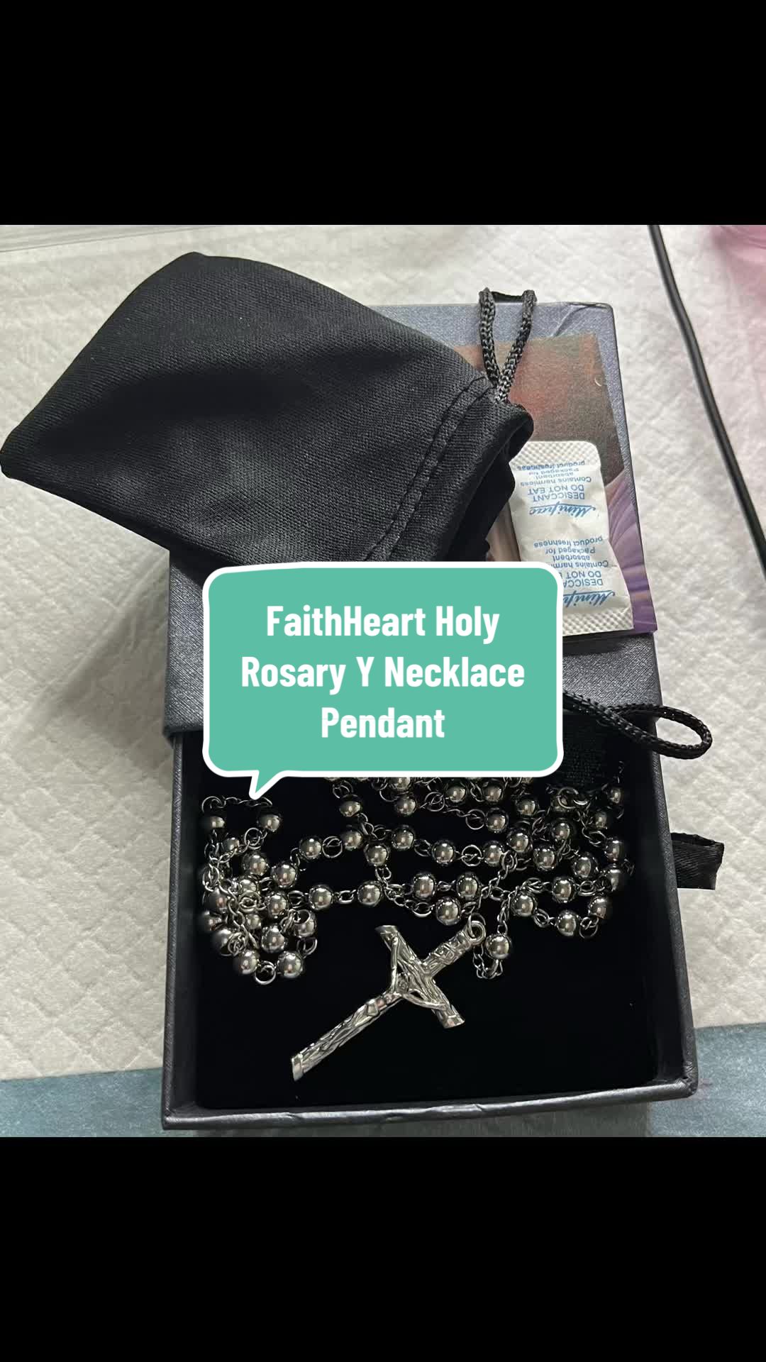 TikTok post by @ladycj_ttshopcreator for FaithHeart Jewelry. Caption reads: Unique Stainless Steel Bead Rosary. Robust &....