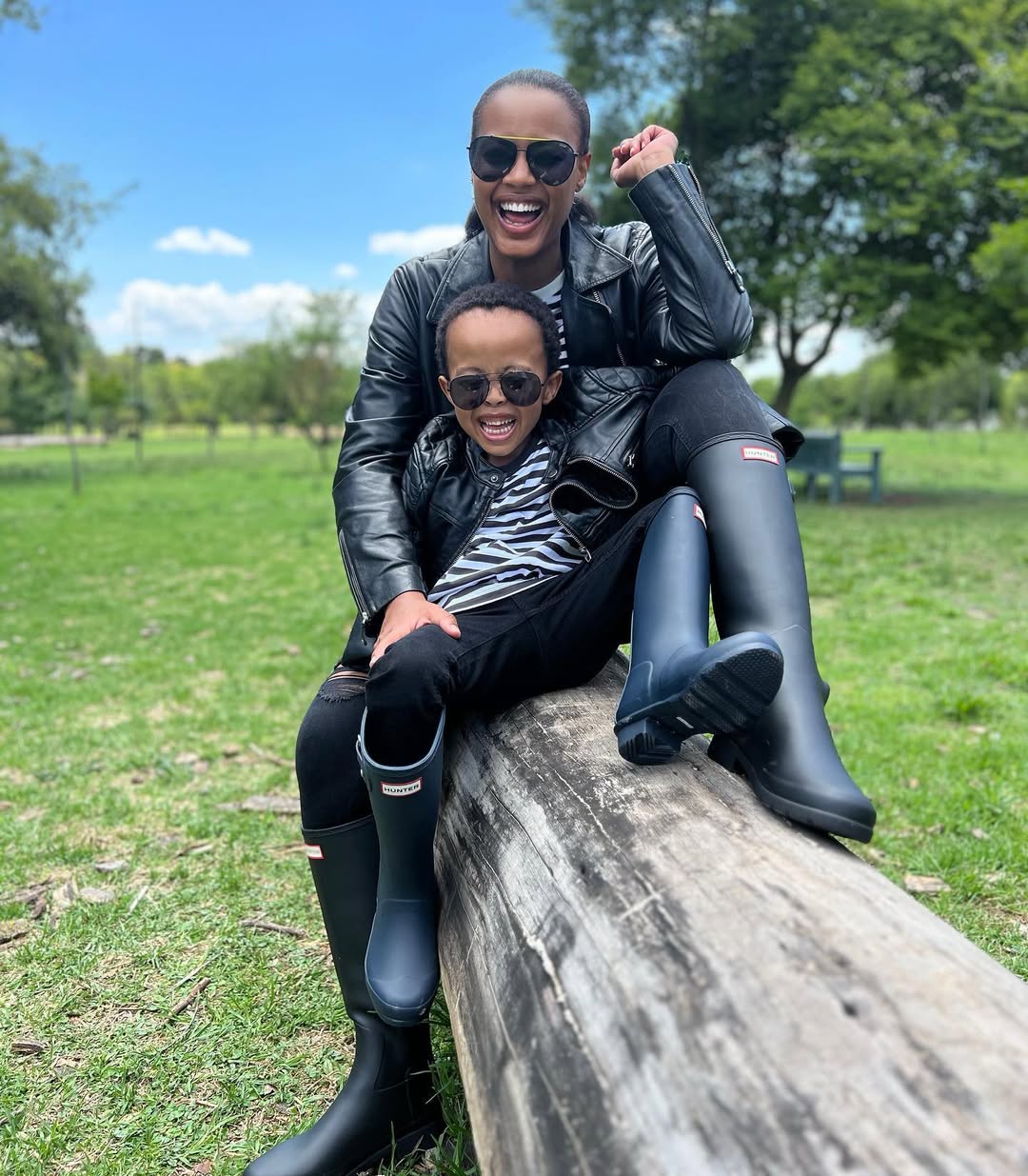 Instagram post by @tshepivundla for Hunter Boots. Caption reads: Rainy Season & twinning with the best little guy....
