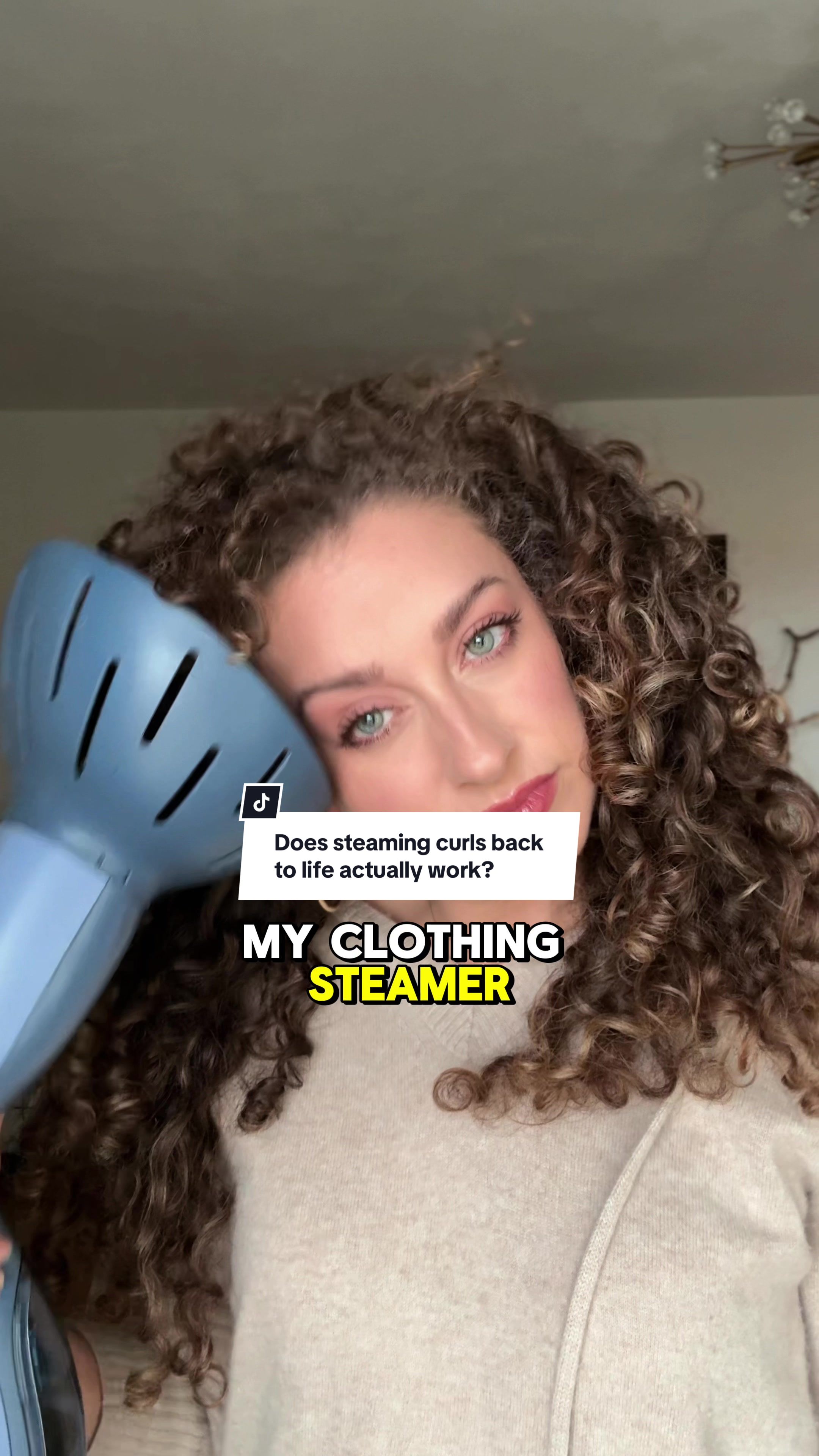 TikTok post by @frizzandfrillzz for Conair. Caption reads: [...] Available now in the TikTok Shop ⬆️ @Conair....