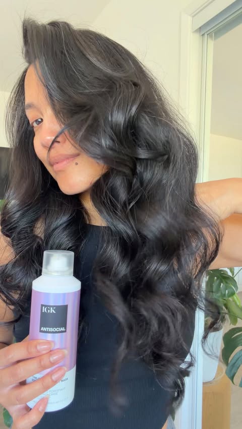 Instagram post by @carissaraemartin for IGK Hair. Caption reads: I never go to sleep without this! 💖 @igkhair....