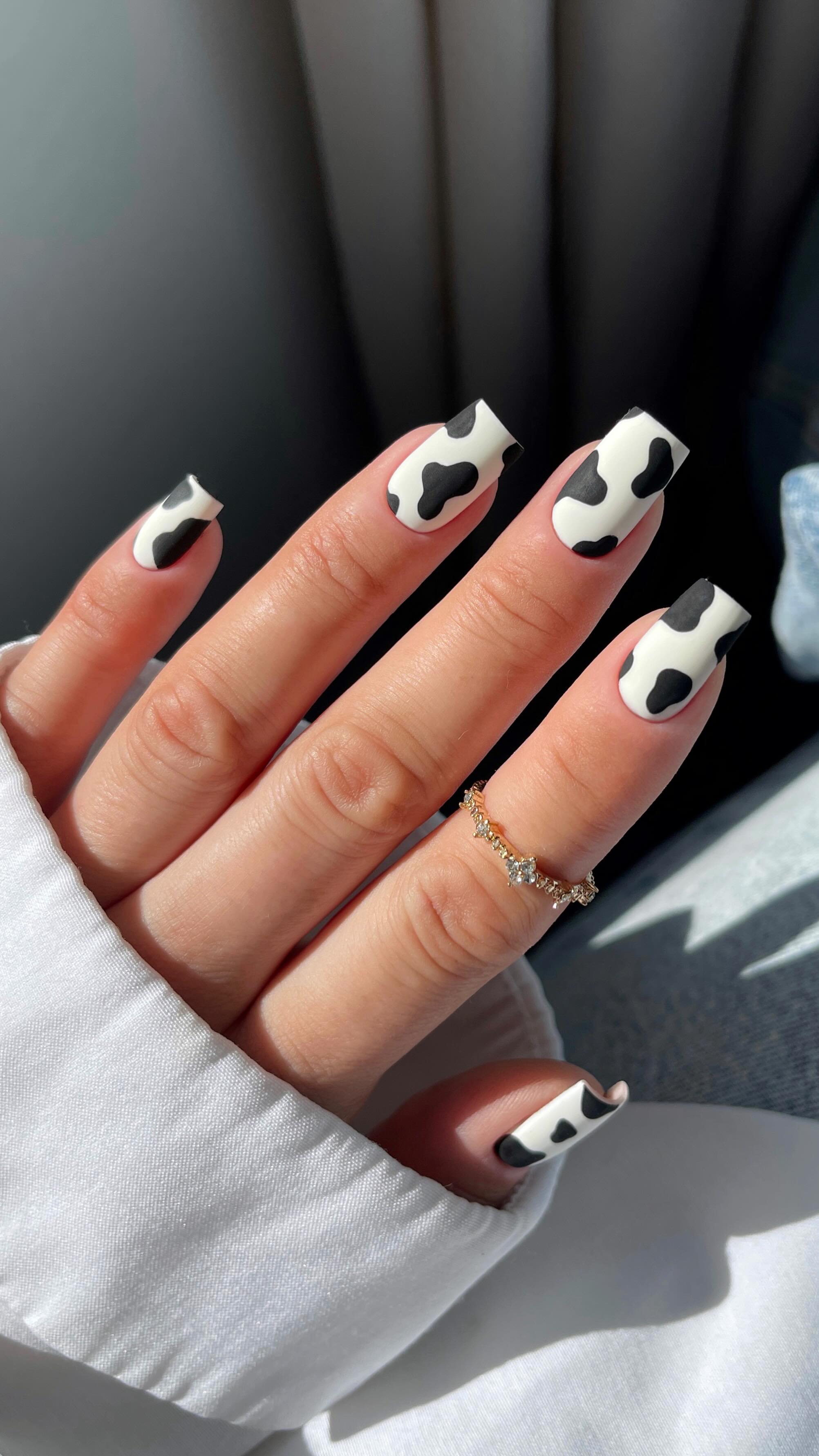 Instagram post by @amanda.sudolll for Semilac. Caption reads: Cow nails 🐮🖤

@semilac 🖤

#cownails....