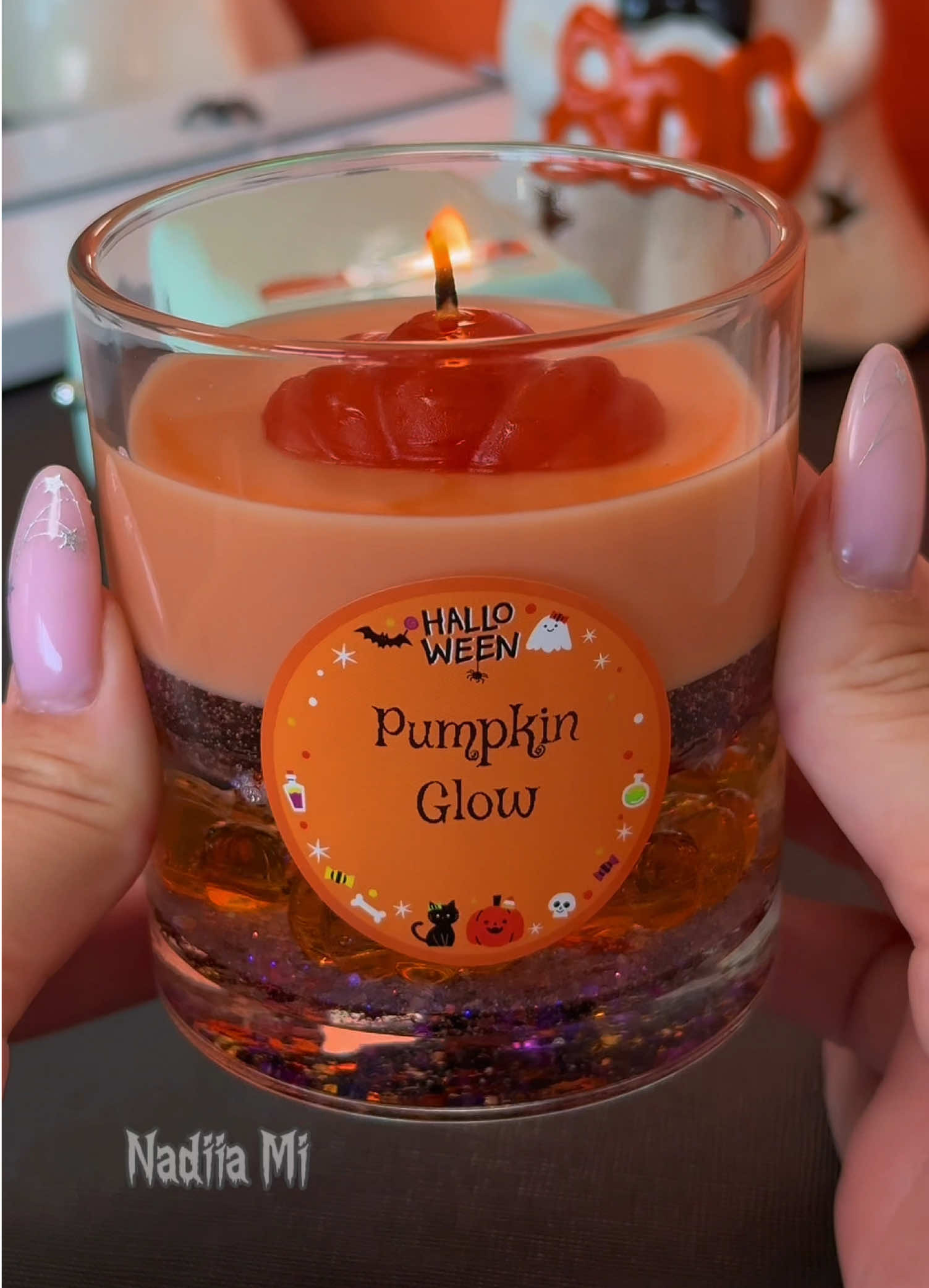 TikTok post by @nadiia.mi for NIIMBOT. Caption reads: [...] this cute “Pumpkin Glow” label with my....