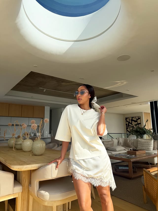 Instagram post by @minniedlamini for Sunglass Hut. Caption reads: [...] to give us a taste of summer 😍 🕶️:....