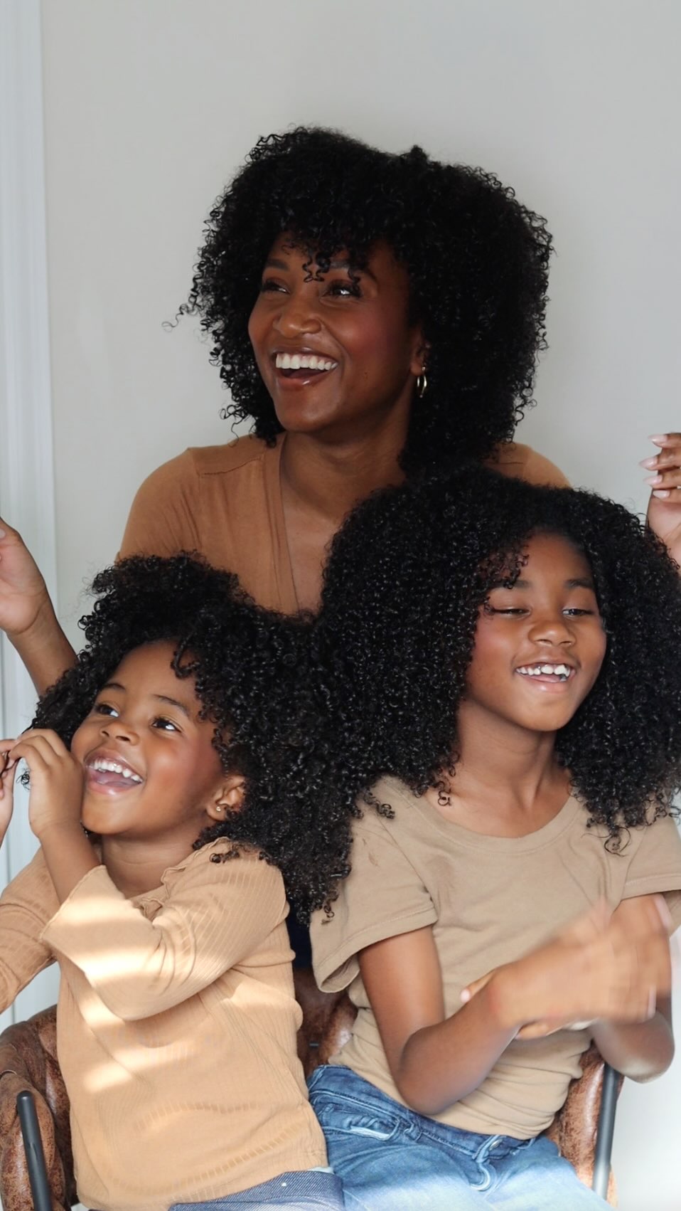Instagram post by @zoeallamby for BounceCurl. Caption reads: Here’s the mother daughter curl transformation....