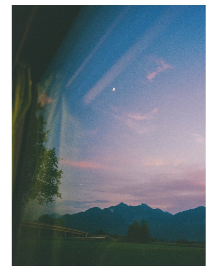 Instagram post by @hej.jade for Kodak. Caption reads: An ode to blue hour on film - those photos that....